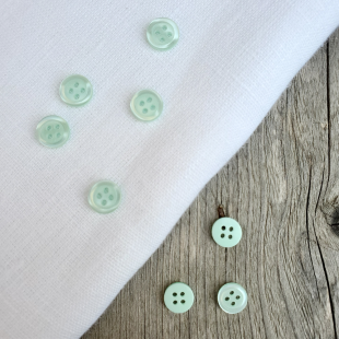 Bouton chemise 4 trous vert d'eau polyester 12mm