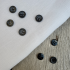 Bouton chemise 4 trous noir polyester 12mm x1